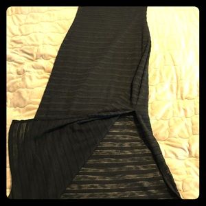 Black short sleeved dress with 2 slits